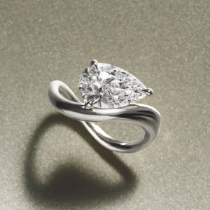Solitaire Pear Cut White Sapphire Engagement Ring For Women