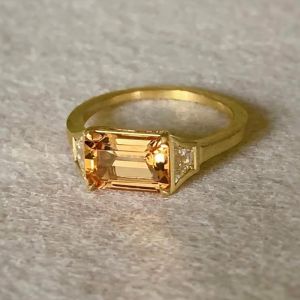 Golden Three Stone Emerald Cut Yellow & White Sapphire Engagement Ring