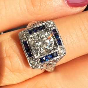 Milgrain Halo Round & Baguette Cut White & Blue Sapphire Art Deco Engagement Ring