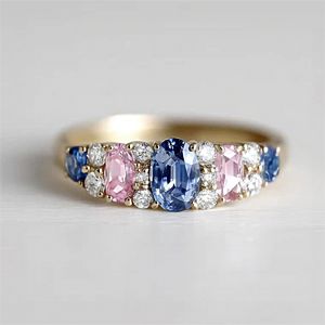 Golden Oval Cut Blue & Pink & White Sapphire Vintage Wedding Band For Women