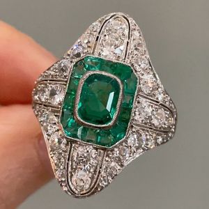 Halo Cushion & Round Cut Emerald & White Sapphire Art Deco Engagement Ring