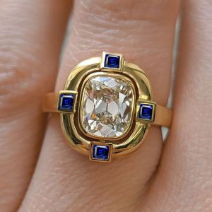 Golden Bezel Cushion Cut White & Blue Sapphire Engagement Ring