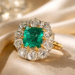 Two Tone Halo Emerald & Round Cut Emerald & White Sapphire Engagement Ring