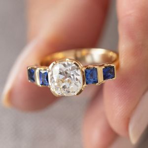 Golden Five Stone Cushion & Baguette Cut White & Blue Sapphire Engagement Ring
