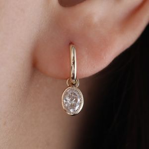 Golden Solitaire Oval Cut White Sapphire Drop Earrings