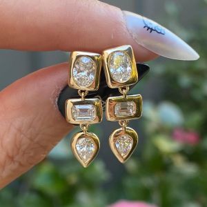 Golden Bezel Oval & Emerald & Pear Cut White Sapphire Drop Earrings