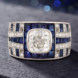 Halo Bezel Cushion & Baguette Cut White & Blue Sapphire Engagement Ring