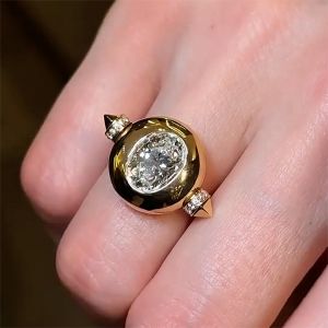 Golden Bezel Oval Cut White Sapphire Engagement Ring