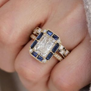 Halo Radiant & Baguette Cut White & Blue Sapphire Engagement Ring Sets