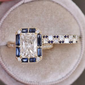 Halo Radiant & Baguette Cut White & Blue Sapphire Engagement Ring Sets