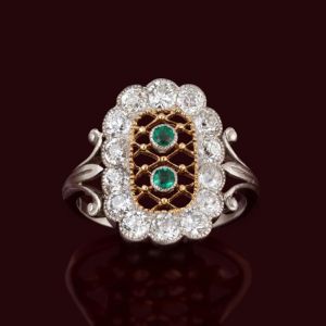 Two Tone Halo Round Cut Emerald & White Sapphire Engagement Ring
