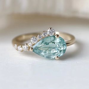 Golden Pear & Round Cut Aquamarine & White Sapphire Engagement Ring
