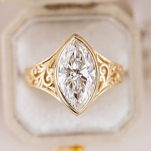 Golden Solitaire Marquise Cut White Sapphire Engagement Ring