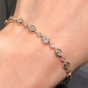 Golden Alternating Oval & Round Cut White Sapphire Tennis Bracelet