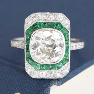 Halo Bezel Cushion & Baguette & Round Cut White & Emerald Sapphire Engagement Ring