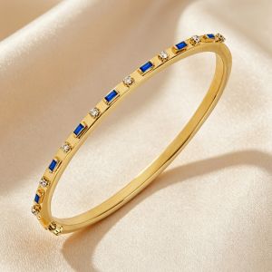Golden Alternating Baguette & Round Cut Blue & White Sapphire Bangle Bracelet