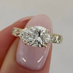 Golden Pear & Round Cut White Sapphire Engagement Ring