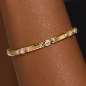 Golden Alternating Oval & Round Cut White Sapphire Tennis Bracelet