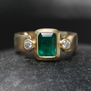Three Stone Bezel Emerald & Round Cut Emerald & White Sapphire Engagement Ring