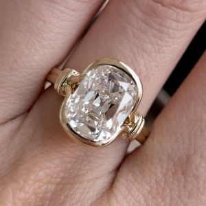 Golden Solitaire Cushion Cut White Sapphire Engagement Ring