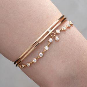 Drape Bezel Round & Baguette Cut White Sapphire Bangle Bracelet