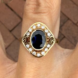 Golden Halo Oval & Round Cut Blue & White Sapphire Engagement Ring