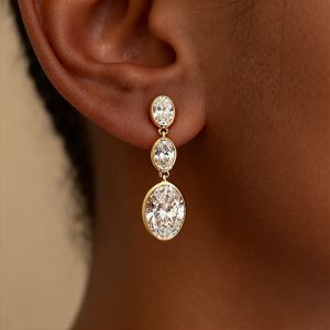 Golden Bezel Oval Cut White Sapphire Drop Earrings