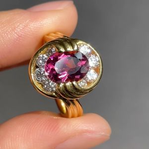 Golden Halo Ruby & White Sapphire Oval & Round Cut Engagement Ring