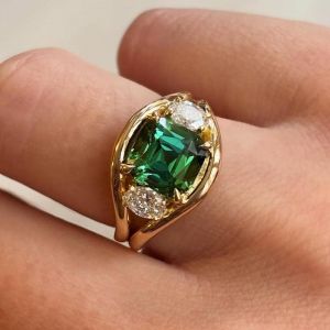 Golden Three Stone Cushion & Oval Cut Emerald & White Sapphire Engagement Ring