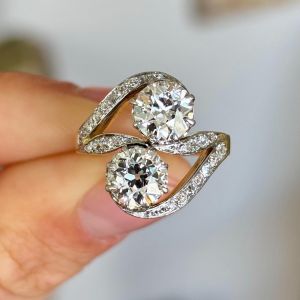 Two Tone Bypass Round Cut White Sapphire Engagement Ring
