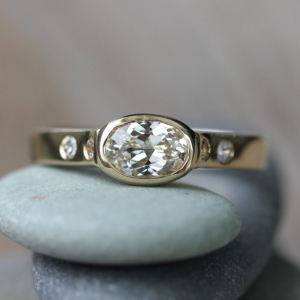 Golden Bezel Oval & Round Cut White Sapphire Engagement Ring