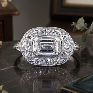 Halo Emerald & Round Cut White Sapphire Engagement Ring