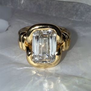 Golden Solitaire Emerald Cut White Sapphire Engagement Ring