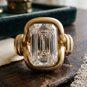 Golden Solitaire Emerald Cut White Sapphire Engagement Ring