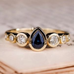 Golden Bezel Pear & Round Cut Blue & White Sapphire Engagement Ring