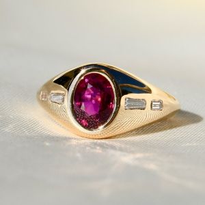Golden Bezel Oval & Baguette Cut Ruby & White Sapphire Engagement Ring