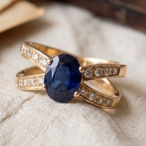 Golden Split Shank Oval & Round Cut Blue & White Sapphire Engagement Ring